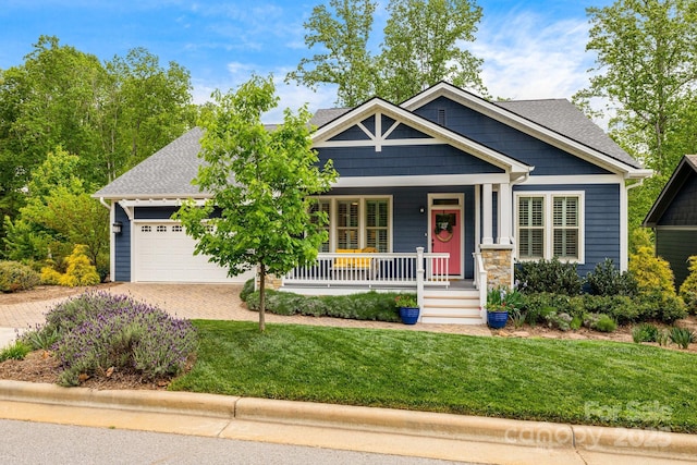 75 Balsam High Rd, Biltmore Lake, NC 28715 - view of front of property featuring a porch, decorative driveway, an attached garage, a front lawn, and roof with shingles