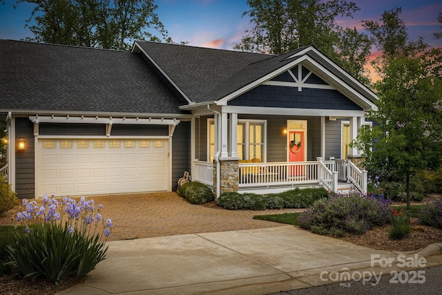 75 Balsam High Rd, Biltmore Lake, NC 28715 - craftsman-style house featuring driveway, covered porch, roof with shingles, and a garage