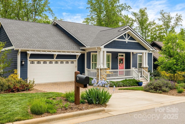 75 Balsam High Rd, Biltmore Lake, NC 28715 - craftsman-style house with covered porch, a shingled roof, a garage, and driveway