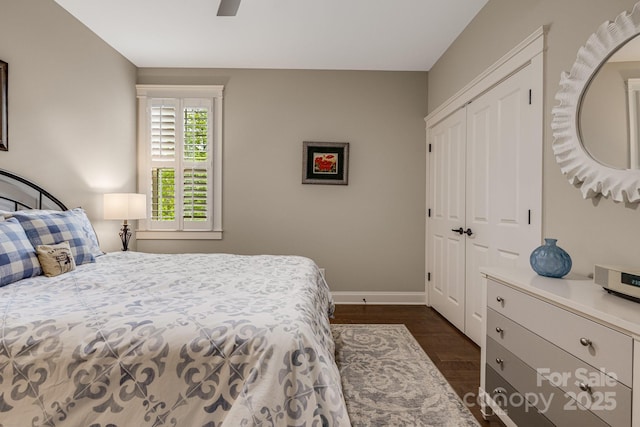75 Balsam High Rd, Biltmore Lake, NC 28715 - bedroom featuring a closet, baseboards, dark wood finished floors, and ceiling fan