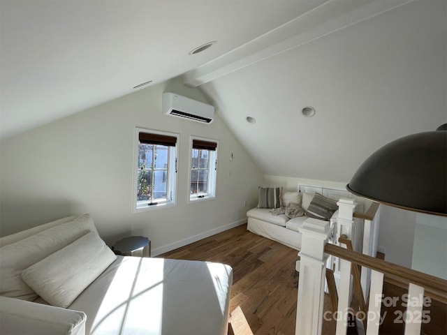 interior space featuring a wall mounted AC, lofted ceiling with beams, baseboards, and wood finished floors