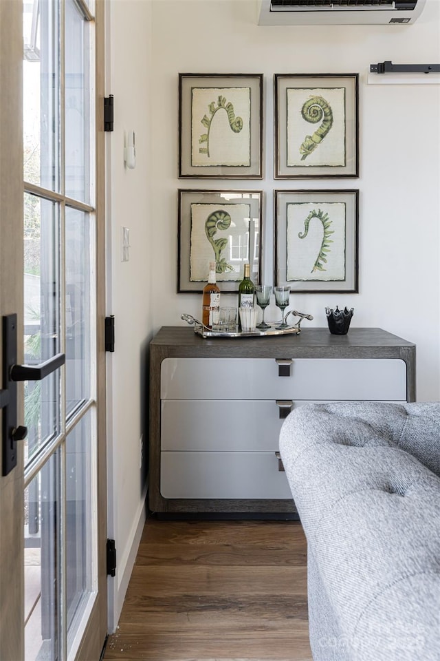 details with wood finished floors and baseboards