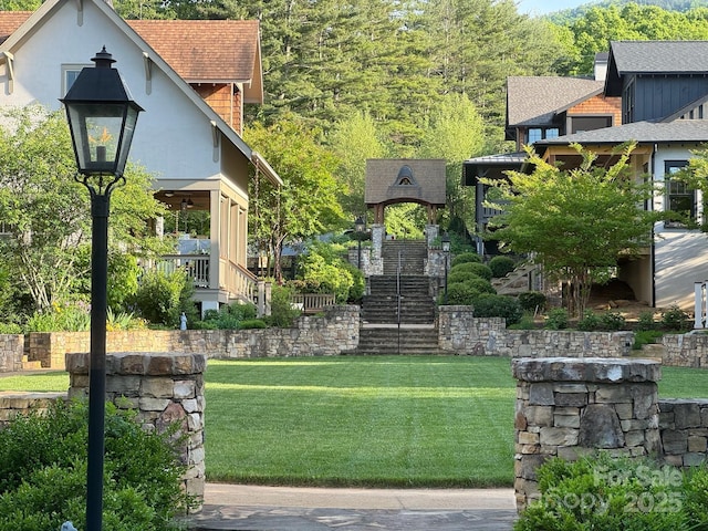 view of yard featuring stairs