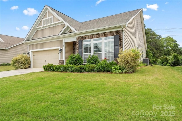 1409 Tupelo Rd, Clover, SC 29710 - view of front facade featuring central AC, a front yard, concrete driveway, brick siding, and an attached garage