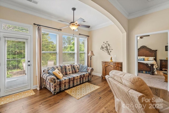 1409 Tupelo Rd, Clover, SC 29710 - living area with ceiling fan, healthy amount of natural light, hardwood / wood-style floors, crown molding, and baseboards