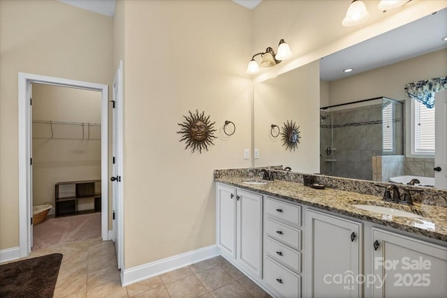 1409 Tupelo Rd, Clover, SC 29710 - full bath with a stall shower, baseboards, a garden tub, and a spacious closet