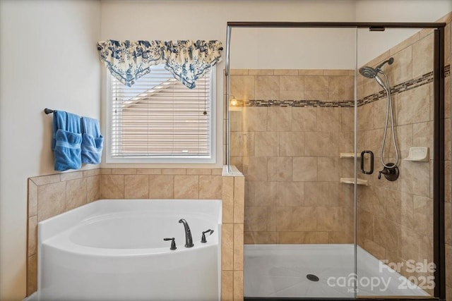 1409 Tupelo Rd, Clover, SC 29710 - full bath with a stall shower and a garden tub
