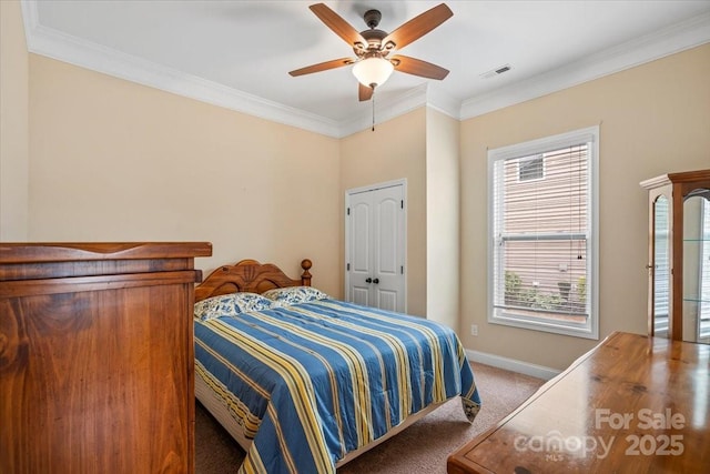 1409 Tupelo Rd, Clover, SC 29710 - carpeted bedroom with crown molding, baseboards, and ceiling fan