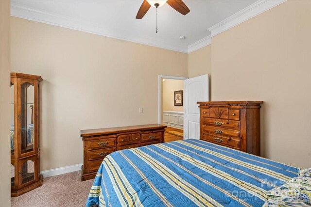 1409 Tupelo Rd, Clover, SC 29710 - carpeted bedroom featuring crown molding, a ceiling fan, and baseboards