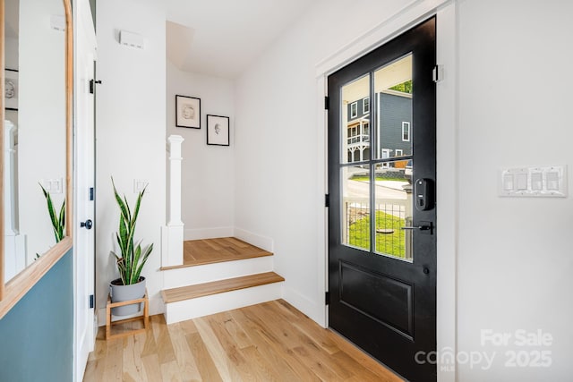 304 Magnolia Ridge Rd, Swannanoa, NC 28778 - foyer entrance with light wood-style floors, baseboards, and stairs