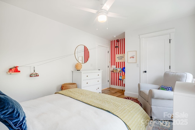 304 Magnolia Ridge Rd, Swannanoa, NC 28778 - bedroom with wood finished floors, ceiling fan, and baseboards