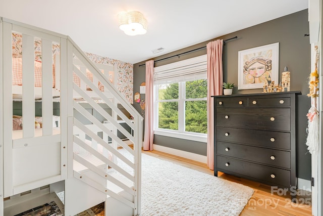 304 Magnolia Ridge Rd, Swannanoa, NC 28778 - bedroom featuring wood finished floors and baseboards