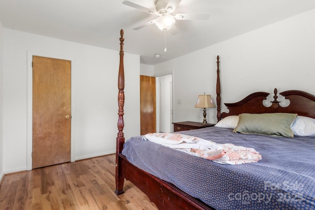 bedroom featuring wood finished floors and ceiling fan