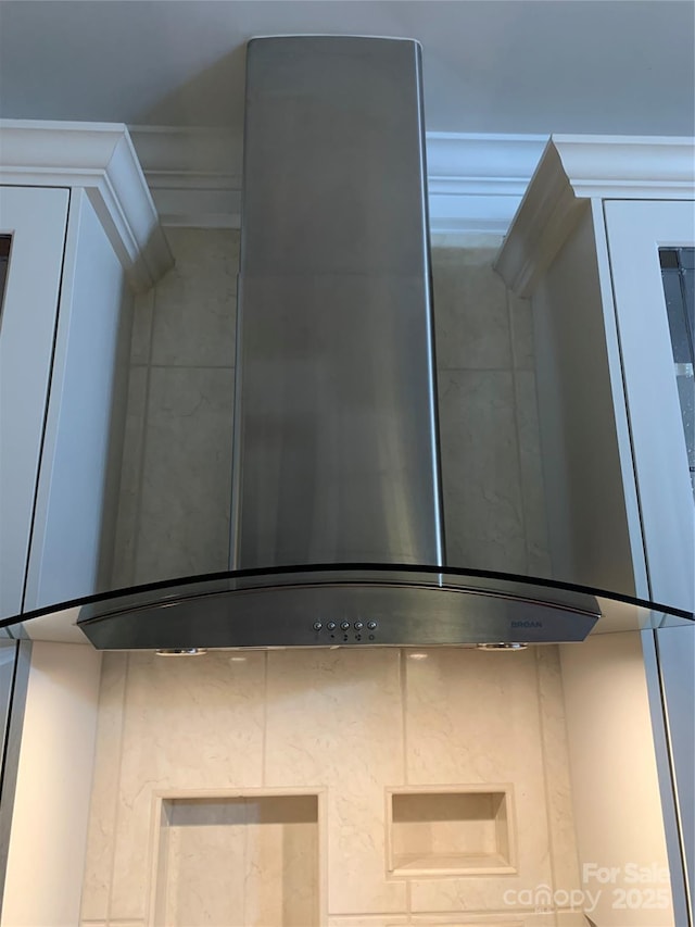 detailed view of wall chimney range hood