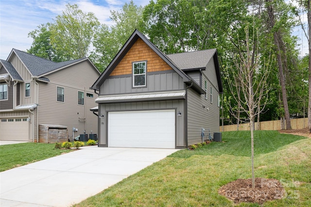 15 Myrtle Lee Cv, Arden, NC 28704 - craftsman-style home with board and batten siding, a garage, driveway, a standing seam roof, and central AC