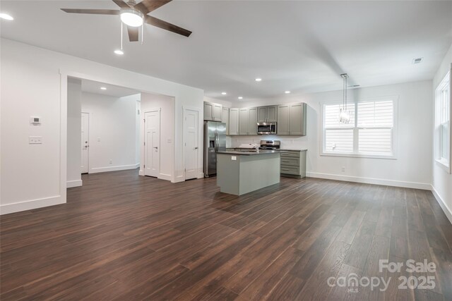 15 Myrtle Lee Cv, Arden, NC 28704 - kitchen featuring appliances with stainless steel finishes, gray cabinets, dark wood-style flooring, ceiling fan, and recessed lighting