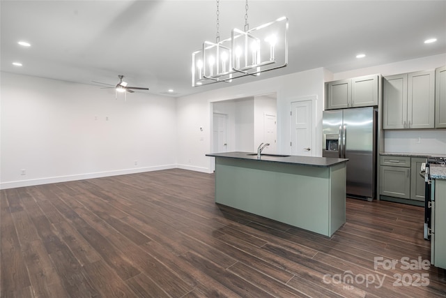 15 Myrtle Lee Cv, Arden, NC 28704 - kitchen featuring stainless steel refrigerator with ice dispenser, a ceiling fan, recessed lighting, an island with sink, and dark countertops