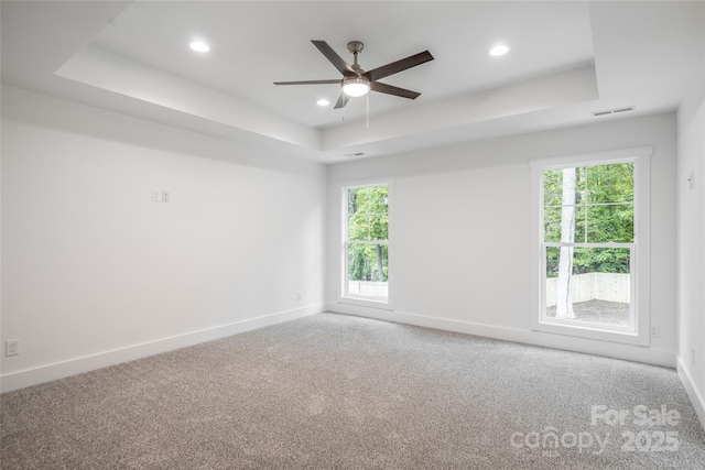 15 Myrtle Lee Cv, Arden, NC 28704 - carpeted empty room with a raised ceiling, ceiling fan, baseboards, and recessed lighting