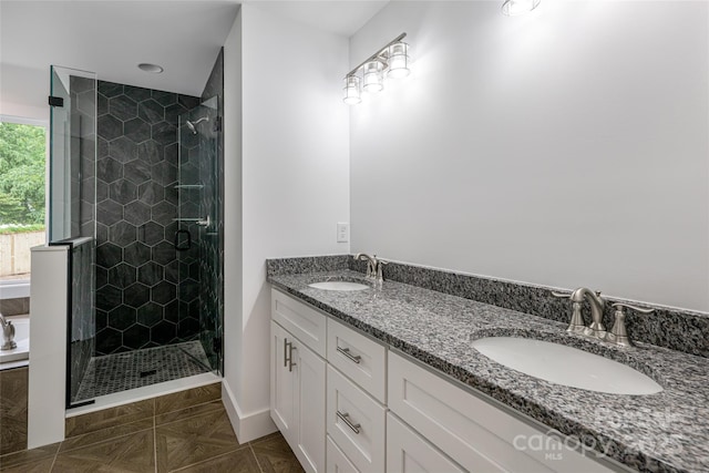 15 Myrtle Lee Cv, Arden, NC 28704 - bathroom with a shower stall and double vanity