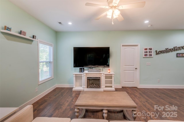210 Holmes Dr, Spartanburg, SC 29303 - living room with wood finished floors, recessed lighting, ceiling fan, and a fireplace