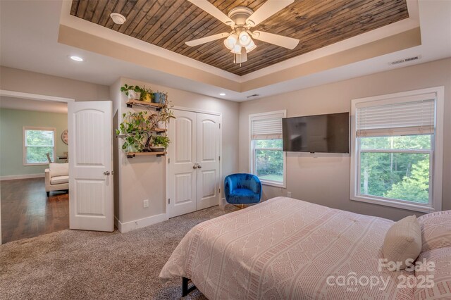 210 Holmes Dr, Spartanburg, SC 29303 - carpeted bedroom with a raised ceiling, wood ceiling, a closet, recessed lighting, and a ceiling fan