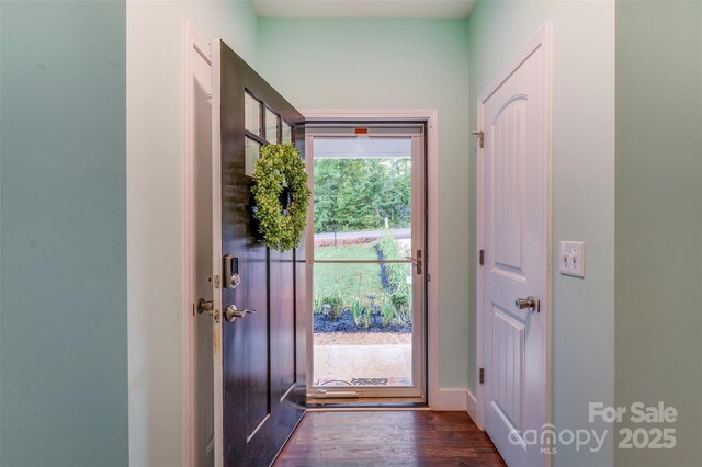 210 Holmes Dr, Spartanburg, SC 29303 - doorway featuring dark wood-type flooring