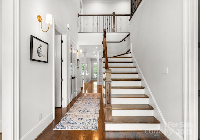 400 Hunter Ln, Charlotte, NC 28211 - foyer entrance featuring stairs, baseboards, wood finished floors, and a high ceiling