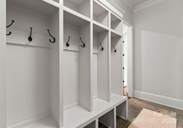 400 Hunter Ln, Charlotte, NC 28211 - mudroom with ornamental molding, baseboards, and dark stone finish flooring