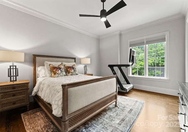 400 Hunter Ln, Charlotte, NC 28211 - bedroom with ornamental molding, baseboards, wood finished floors, and a ceiling fan