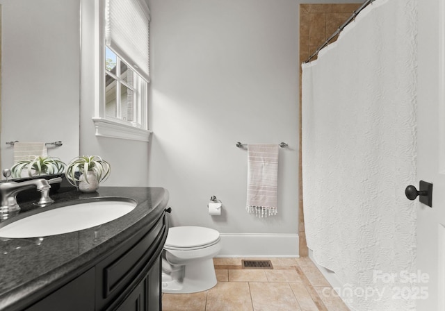 400 Hunter Ln, Charlotte, NC 28211 - bathroom with toilet, vanity, tile patterned flooring, and a shower with shower curtain