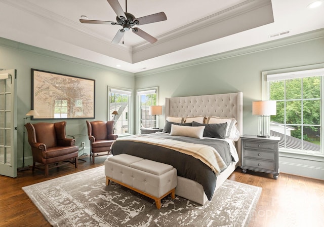 400 Hunter Ln, Charlotte, NC 28211 - bedroom featuring a raised ceiling, crown molding, wood finished floors, a ceiling fan, and recessed lighting