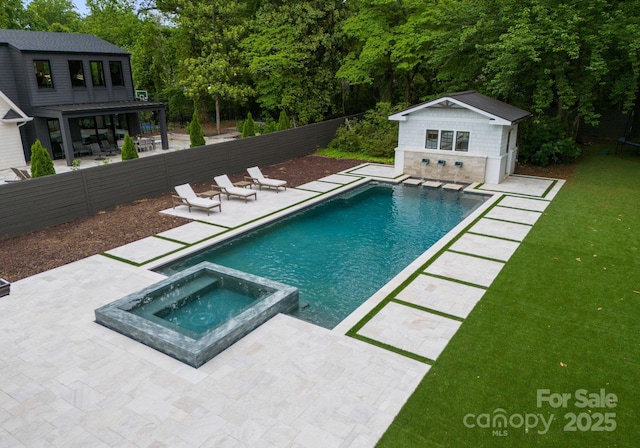 400 Hunter Ln, Charlotte, NC 28211 - view of swimming pool with a patio, a storage structure, an outdoor structure, a pool with connected hot tub, and view of wooded area