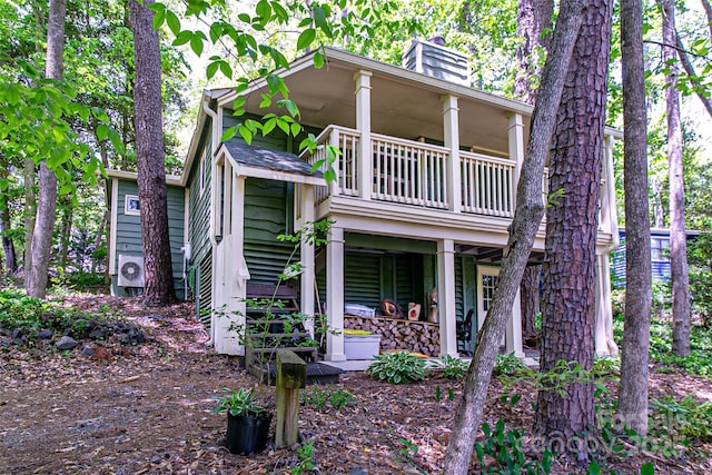 70 Lake Sega Cir, Brevard, NC 28712 - view of front facade with a balcony and a chimney