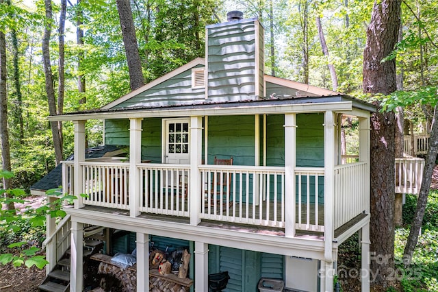 70 Lake Sega Cir, Brevard, NC 28712 - view of side of home featuring a chimney
