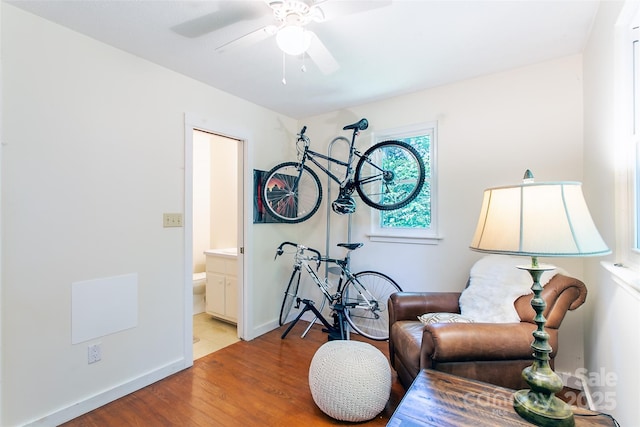 70 Lake Sega Cir, Brevard, NC 28712 - sitting room with light wood-type flooring, a ceiling fan, and baseboards