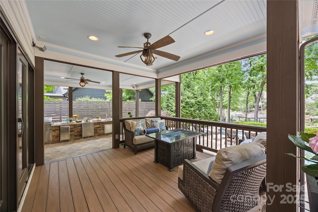 19614 Meta Rd, Cornelius, NC 28031 - sunroom with ceiling fan and an outdoor living space