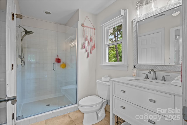 19614 Meta Rd, Cornelius, NC 28031 - full bath with a stall shower, toilet, tile patterned flooring, and vanity