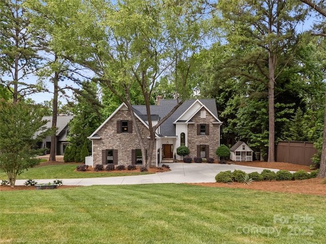 19614 Meta Rd, Cornelius, NC 28031 - craftsman inspired home with stone siding, a chimney, and concrete driveway