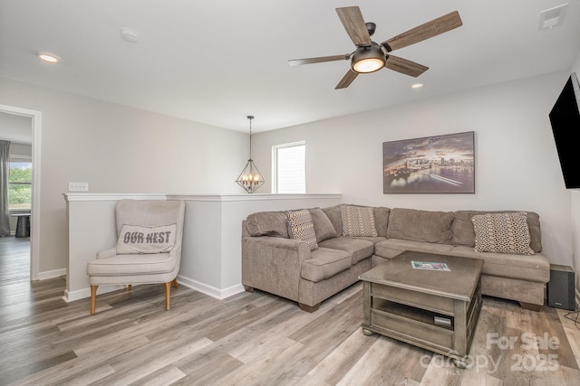 living room with visible vents, recessed lighting, light wood finished floors, ceiling fan, and baseboards