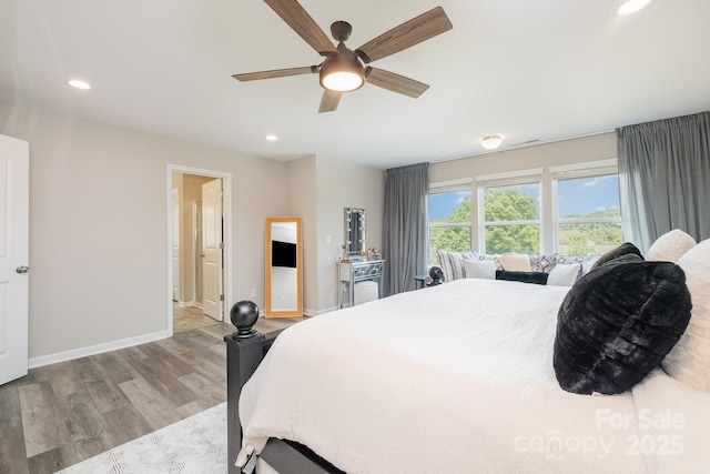 bedroom featuring ceiling fan, recessed lighting, baseboards, and wood finished floors