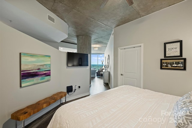 bedroom with wood finished floors
