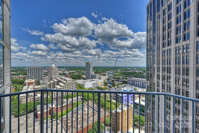 balcony featuring a city view