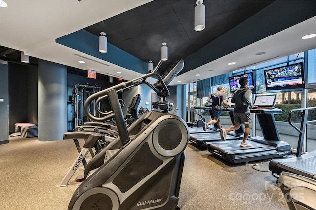 exercise room featuring recessed lighting and carpet floors
