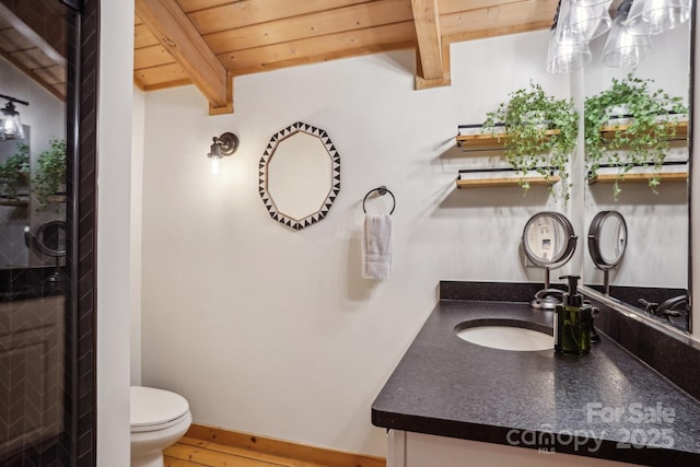909 Niley Cook Rd, Blowing Rock, NC 28605 - bathroom with wood ceiling, toilet, wood finished floors, beam ceiling, and vanity