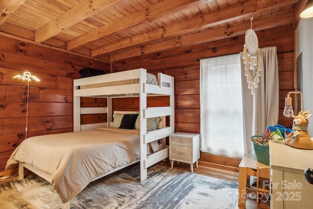 909 Niley Cook Rd, Blowing Rock, NC 28605 - bedroom featuring wooden walls, wood ceiling, beamed ceiling, and wood finished floors