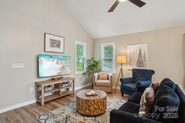 909 Niley Cook Rd, Blowing Rock, NC 28605 - living area with baseboards, high vaulted ceiling, ceiling fan, and wood finished floors