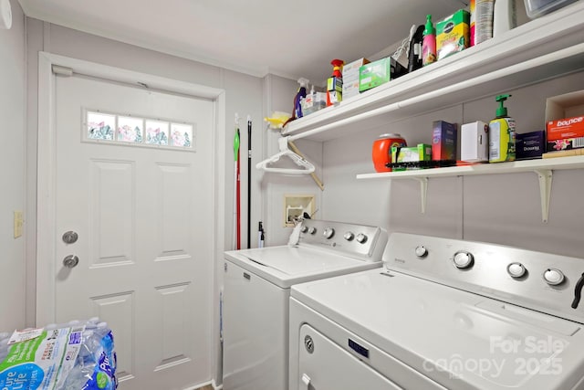 laundry area featuring laundry area and washer and dryer