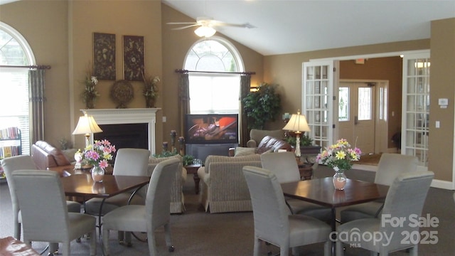 835A Wynnshire Dr Unit 53, Hickory, NC 28601 - dining area with a fireplace, ceiling fan, french doors, and vaulted ceiling
