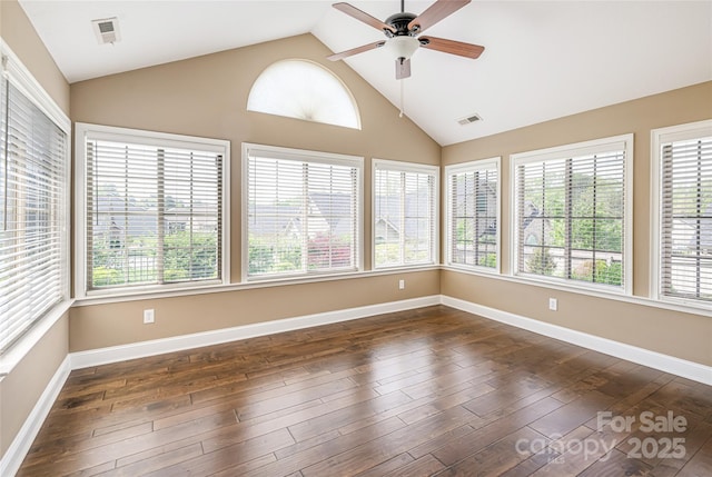 33 Braeburn Way, Flat Rock, NC 28731 - unfurnished sunroom with baseboards, wood finished floors, visible vents, and vaulted ceiling