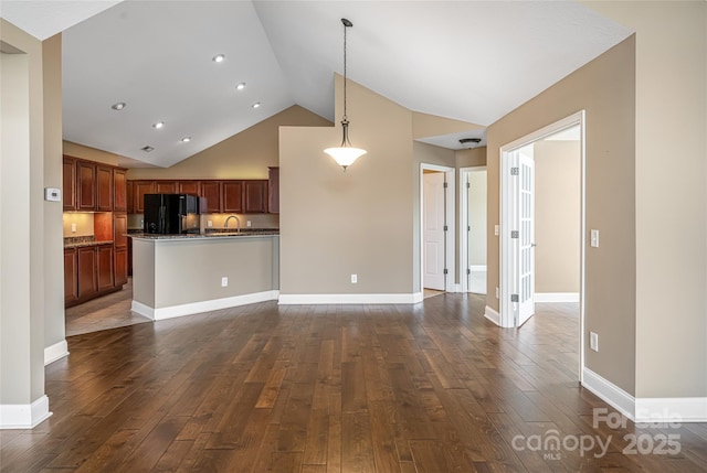 33 Braeburn Way, Flat Rock, NC 28731 - unfurnished living room featuring recessed lighting, high vaulted ceiling, baseboards, and dark wood-style floors